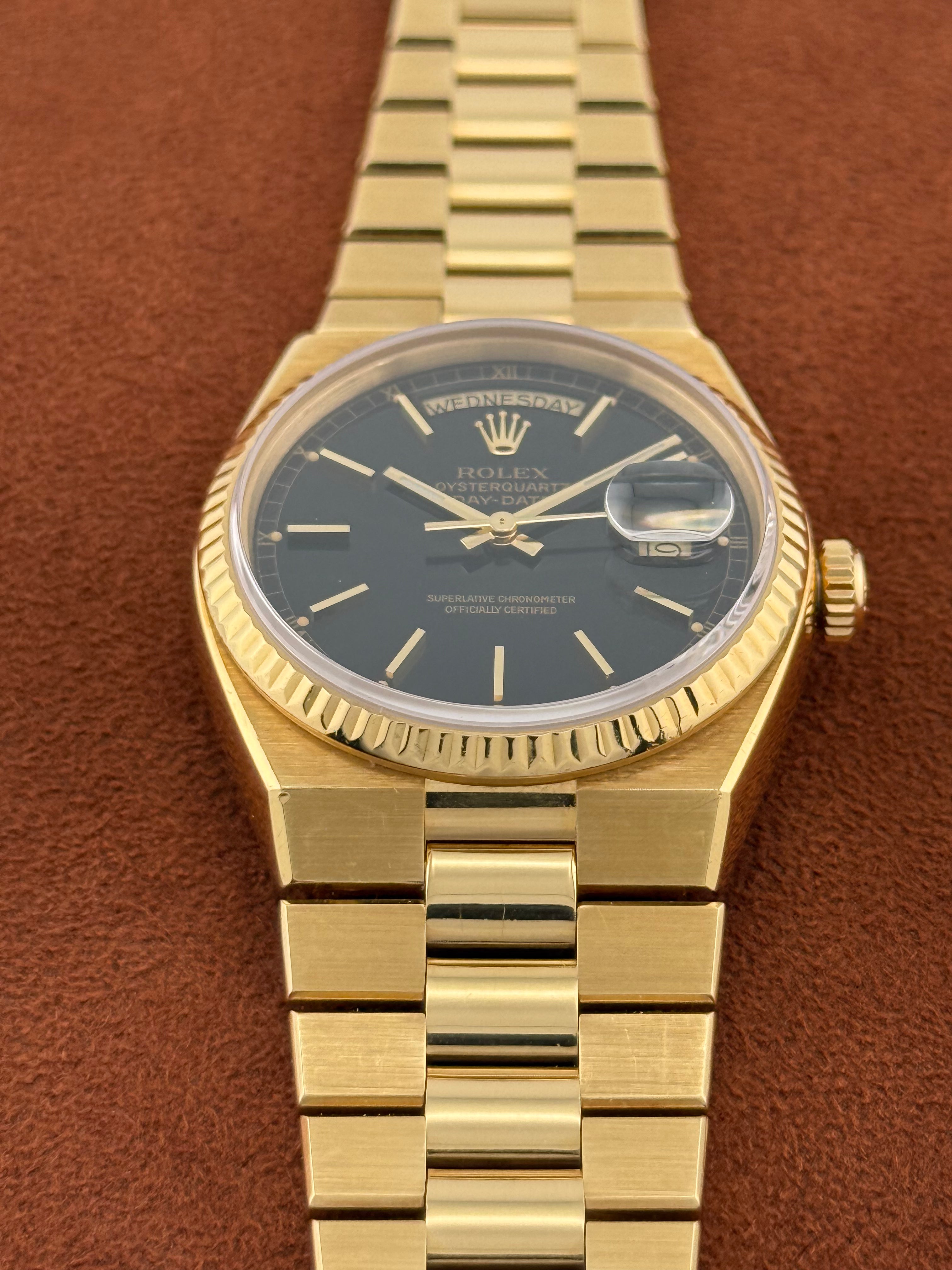 Rolex Oysterquartz Day-Date Ref. 19018 – Black Dial, 18K Yellow Gold Bracelet Watch