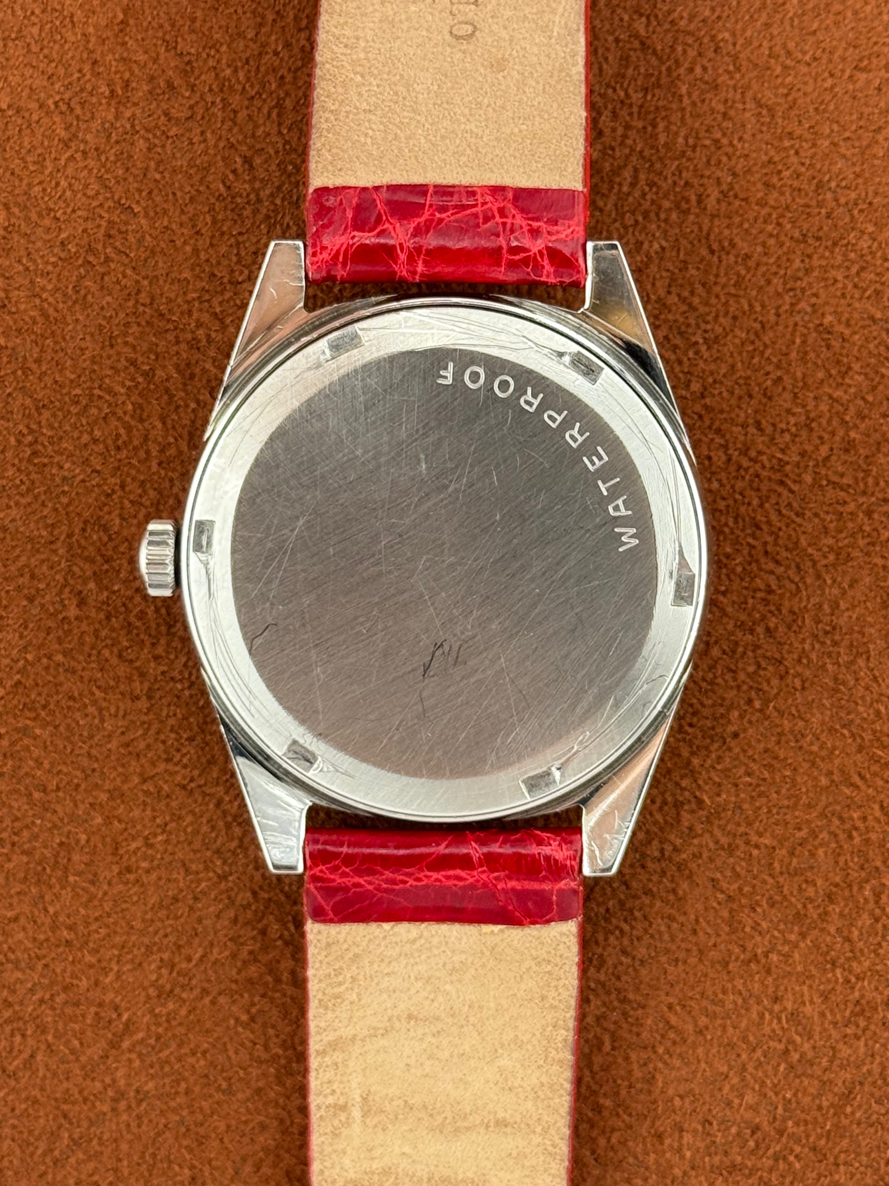 Omega Genève “Red Devil” Ref. 135.041 – Stainless Steel